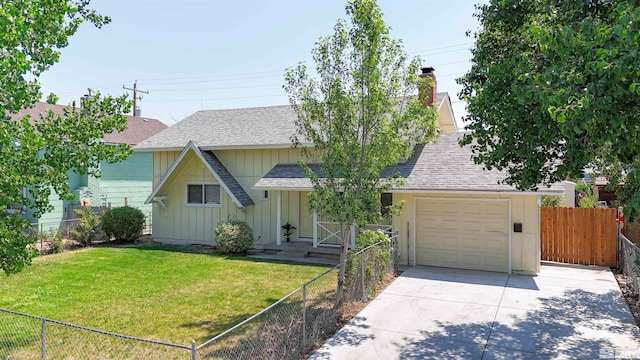 view of front of home featuring a garage and a front lawn