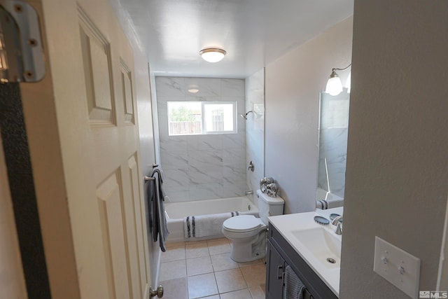 full bathroom with tile patterned flooring, vanity, toilet, and tiled shower / bath