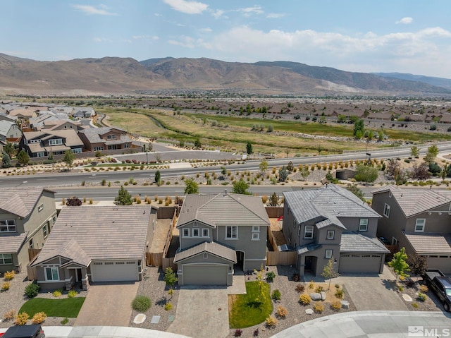 drone / aerial view featuring a mountain view