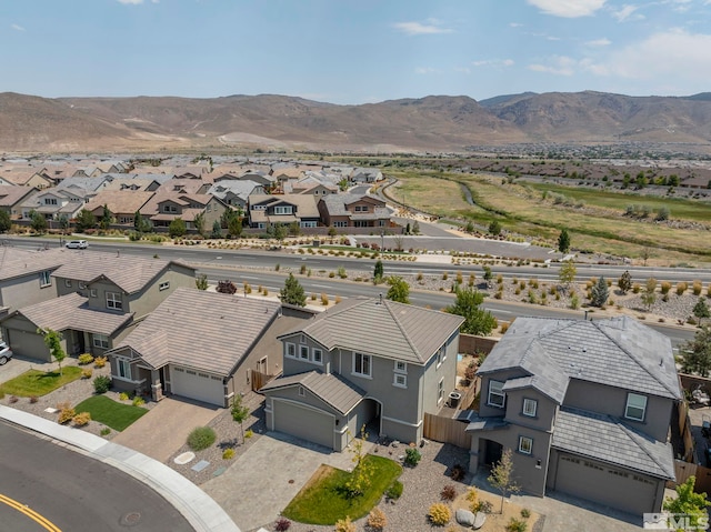 drone / aerial view featuring a mountain view