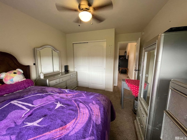 bedroom featuring ceiling fan, carpet, and a closet