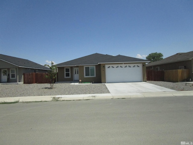 single story home with a garage