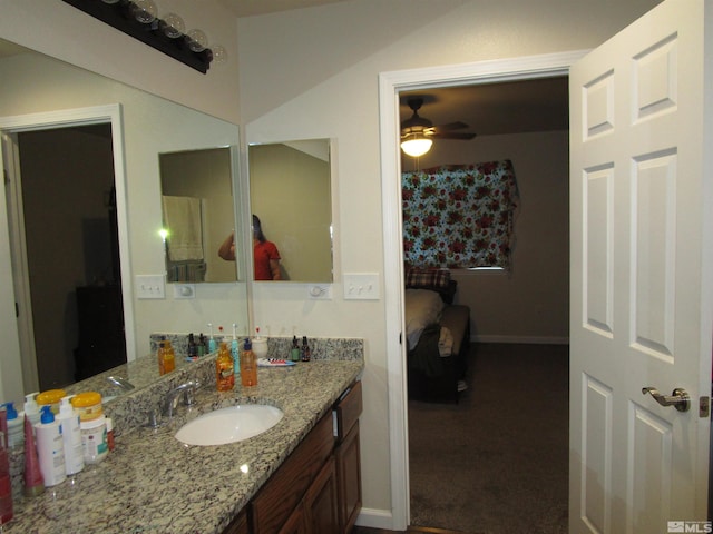 bathroom featuring ceiling fan and vanity