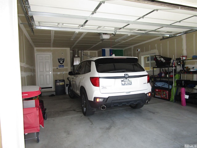 garage featuring a garage door opener