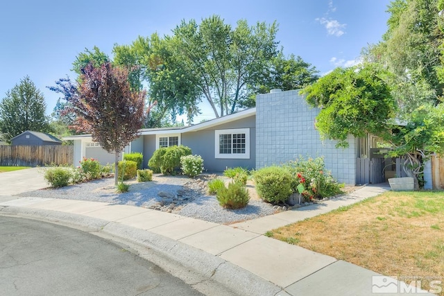 single story home with a garage