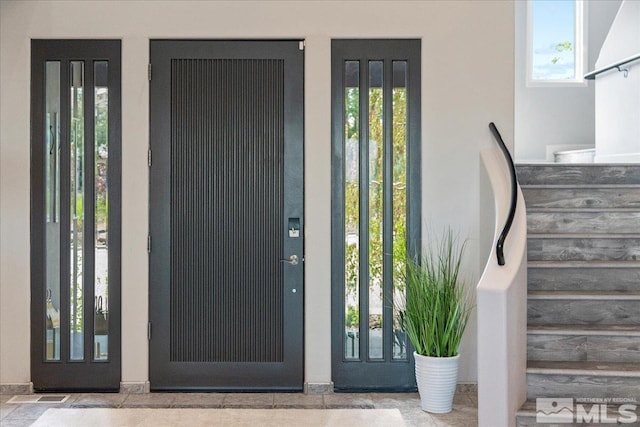 entrance foyer featuring a healthy amount of sunlight