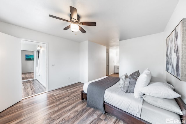 bedroom featuring ceiling fan and wood-type flooring