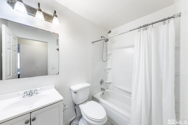 full bathroom with vanity, toilet, and shower / bath combo