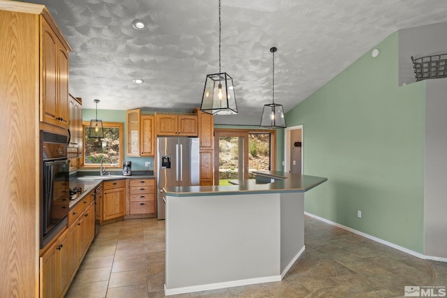 kitchen with a wealth of natural light, tile patterned flooring, black oven, and a kitchen island