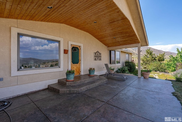 view of patio with a mountain view