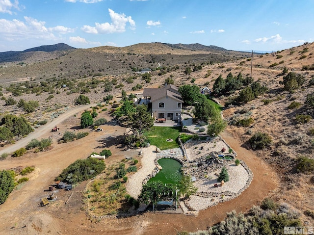 aerial view featuring a mountain view