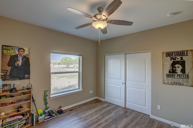 bedroom featuring a closet, ceiling fan, and light hardwood / wood-style floors