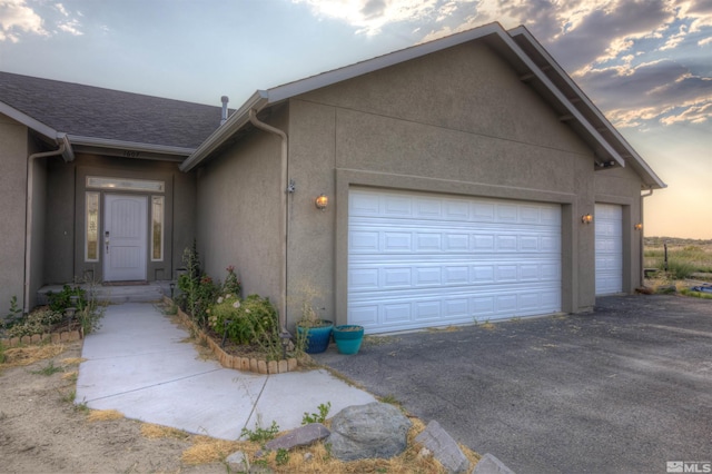 exterior space featuring a garage