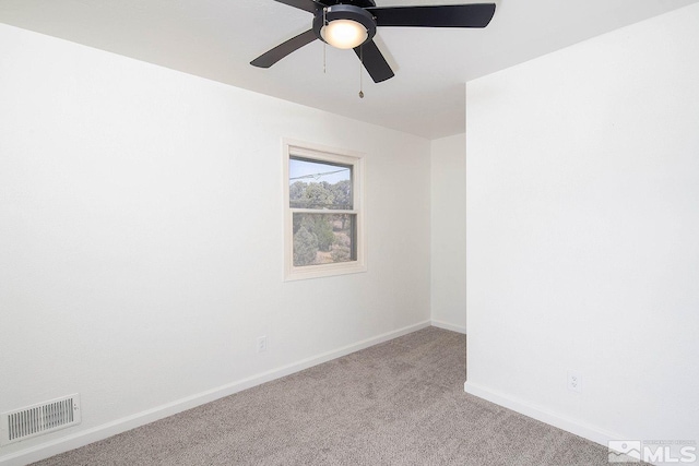 empty room with light carpet and ceiling fan