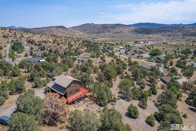 drone / aerial view featuring a mountain view