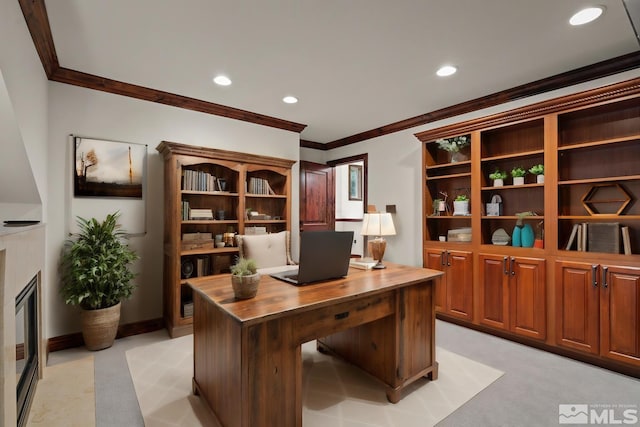 carpeted home office with ornamental molding