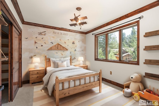 carpeted bedroom with crown molding