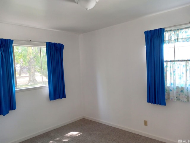 view of carpeted spare room