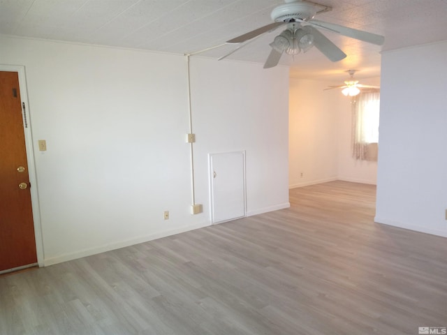 unfurnished room featuring light hardwood / wood-style floors