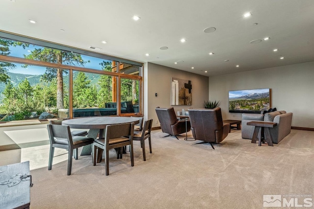 view of carpeted dining area