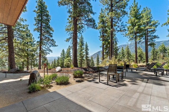 view of patio with a mountain view