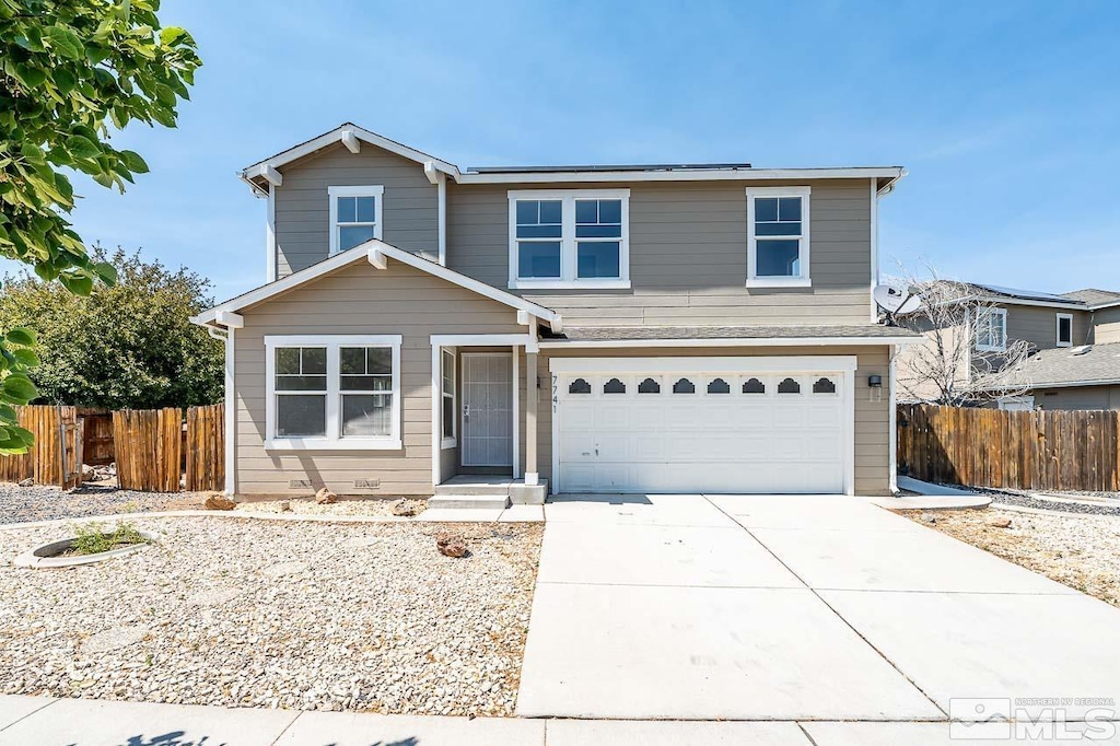 view of property with a garage