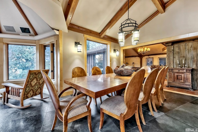 tiled dining room featuring lofted ceiling with beams, a chandelier, and plenty of natural light