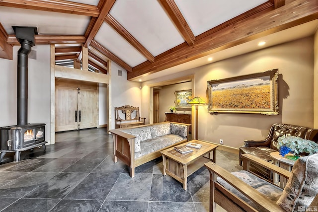 tiled living room featuring a wood stove and vaulted ceiling with beams