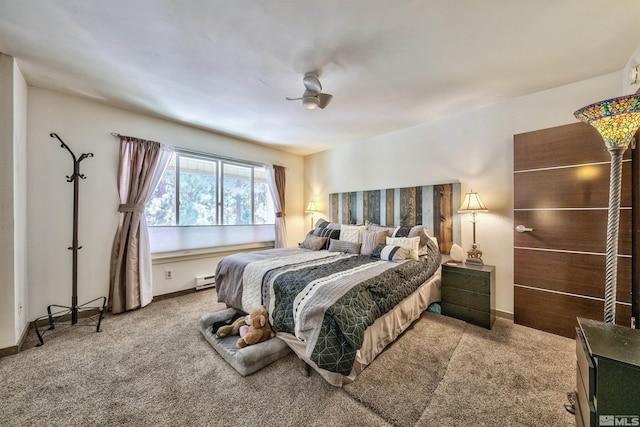 bedroom featuring a baseboard radiator, carpet floors, and ceiling fan