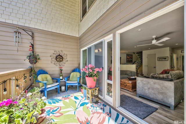 exterior space featuring ceiling fan