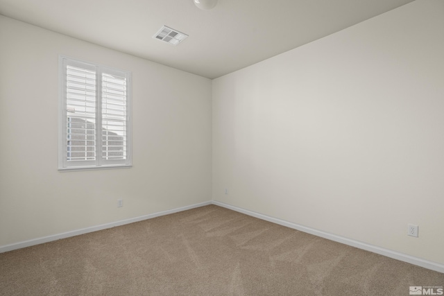 unfurnished room featuring carpet floors