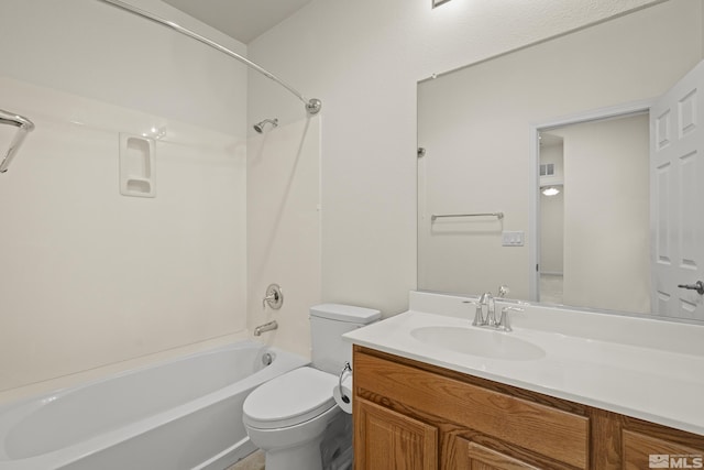 full bathroom featuring toilet,  shower combination, and vanity