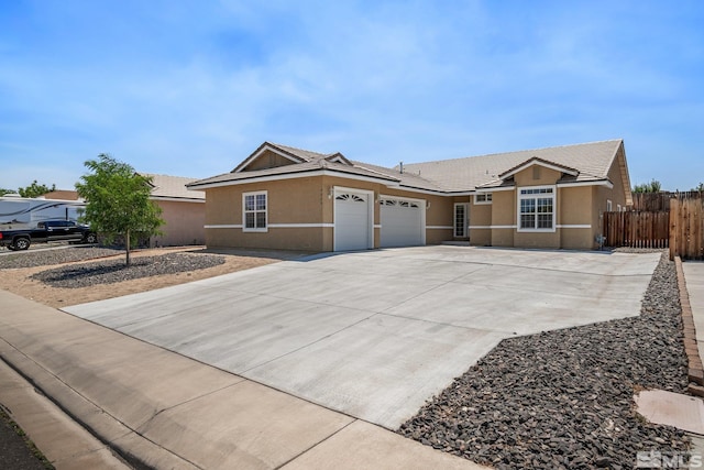 single story home featuring a garage