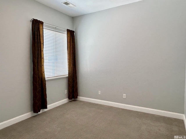 view of carpeted spare room