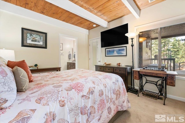 carpeted bedroom with wooden ceiling, connected bathroom, access to exterior, and beam ceiling