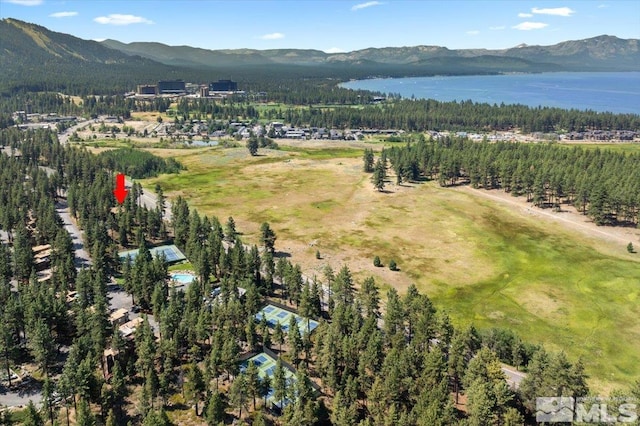 bird's eye view with a water and mountain view