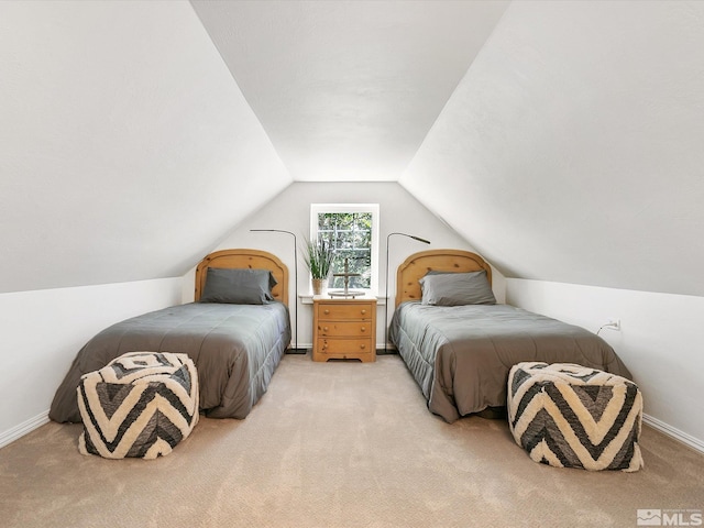 bedroom with light carpet and vaulted ceiling