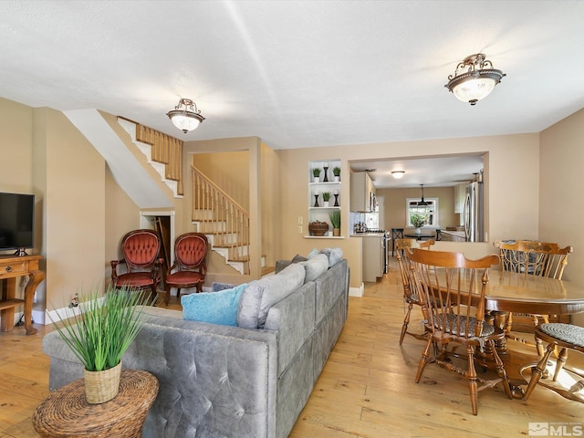 living room with light hardwood / wood-style floors