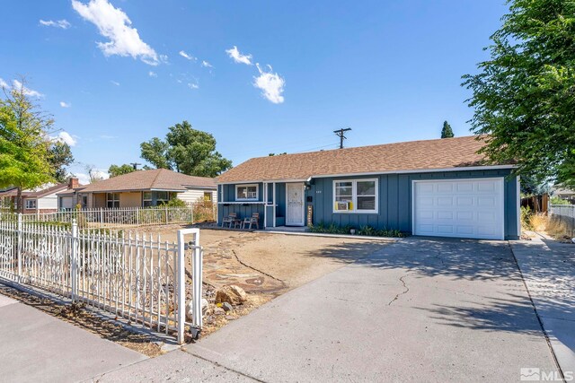 single story home featuring a garage