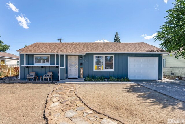 ranch-style home with a garage