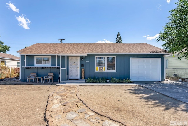 ranch-style home with a garage