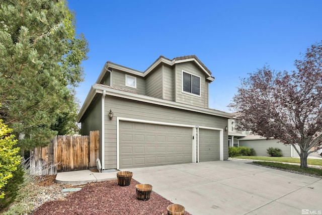 view of front of property with a garage