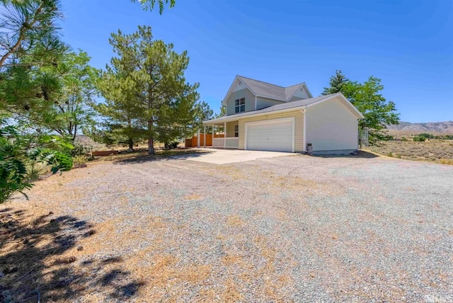 view of property exterior featuring a garage