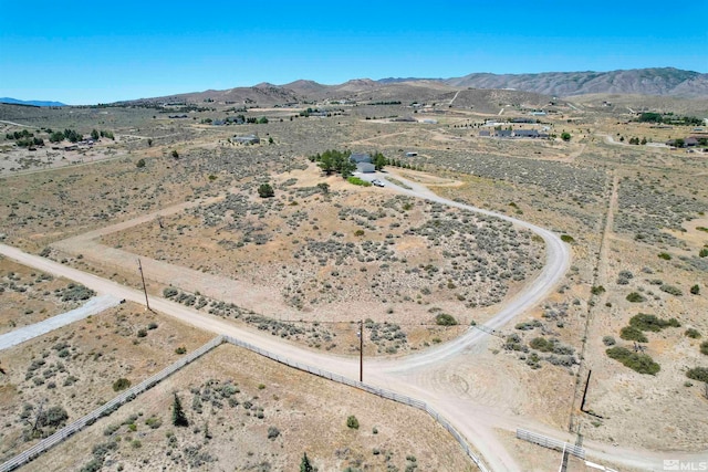 drone / aerial view featuring a mountain view