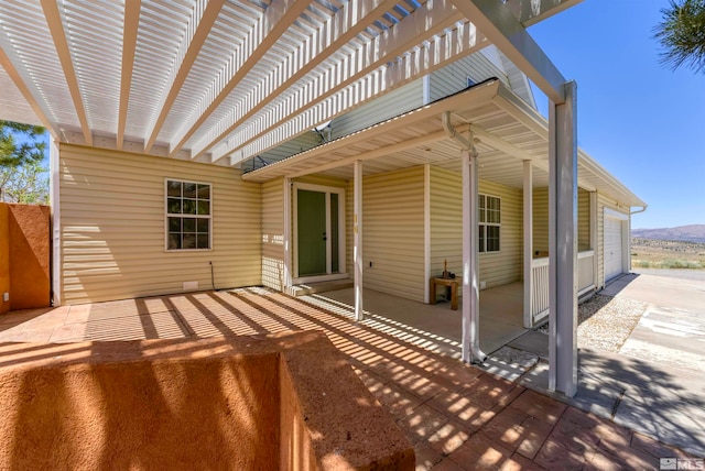 view of patio featuring a pergola