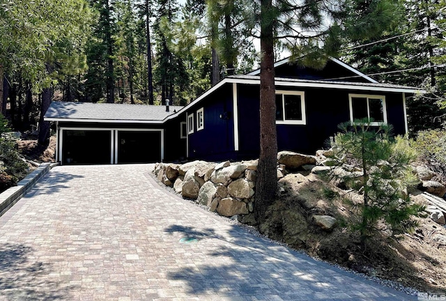 view of home's exterior featuring a carport