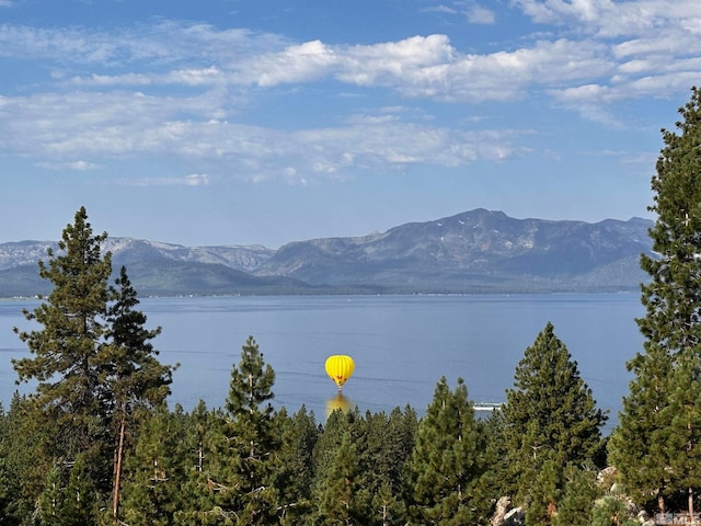 property view of water featuring a mountain view