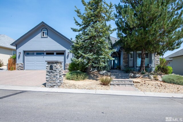 view of front of home with a garage