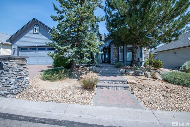 view of front of property featuring a garage