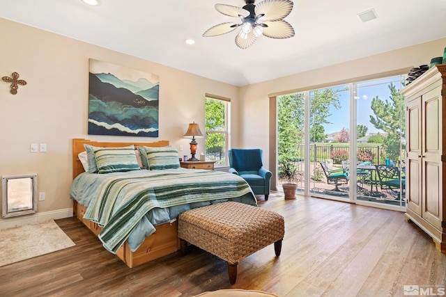 bedroom with baseboards, a ceiling fan, wood finished floors, access to exterior, and recessed lighting